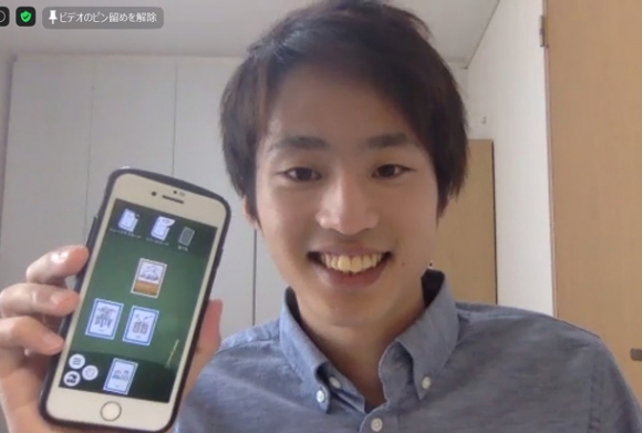 ＳＤＧｓを題材にしたスマホ向けゲームを紹介する鈴木健斗さん＝ビデオ会議アプリ「Ｚｏｏｍ」から