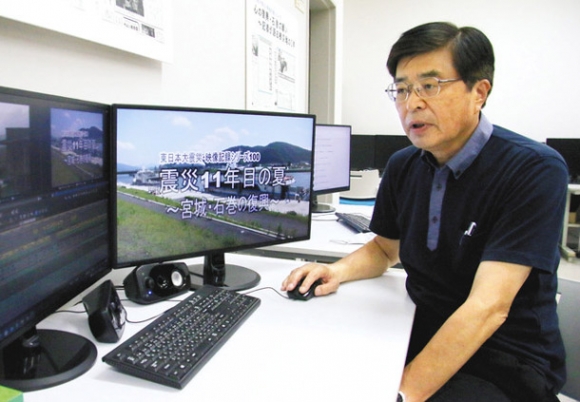 映像記録シリーズの100本目となる記録映像を紹介する栃窪教授=千種区の椙山女学園大で